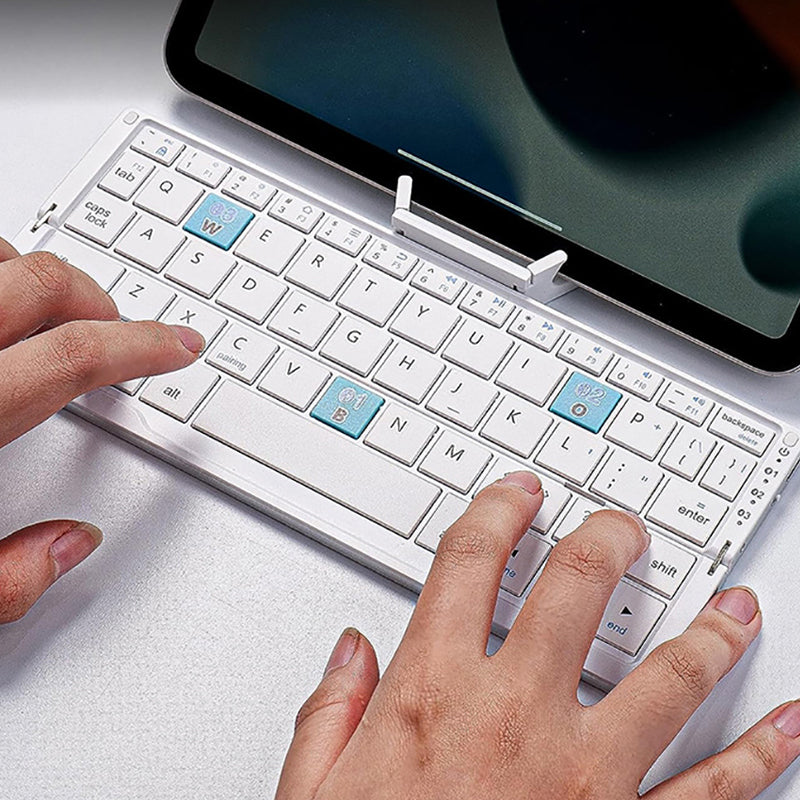 Bærbar sammenleggbar bluetooth mini-tastatur