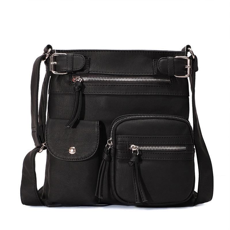 Myk crossbody-veske med flere lommer