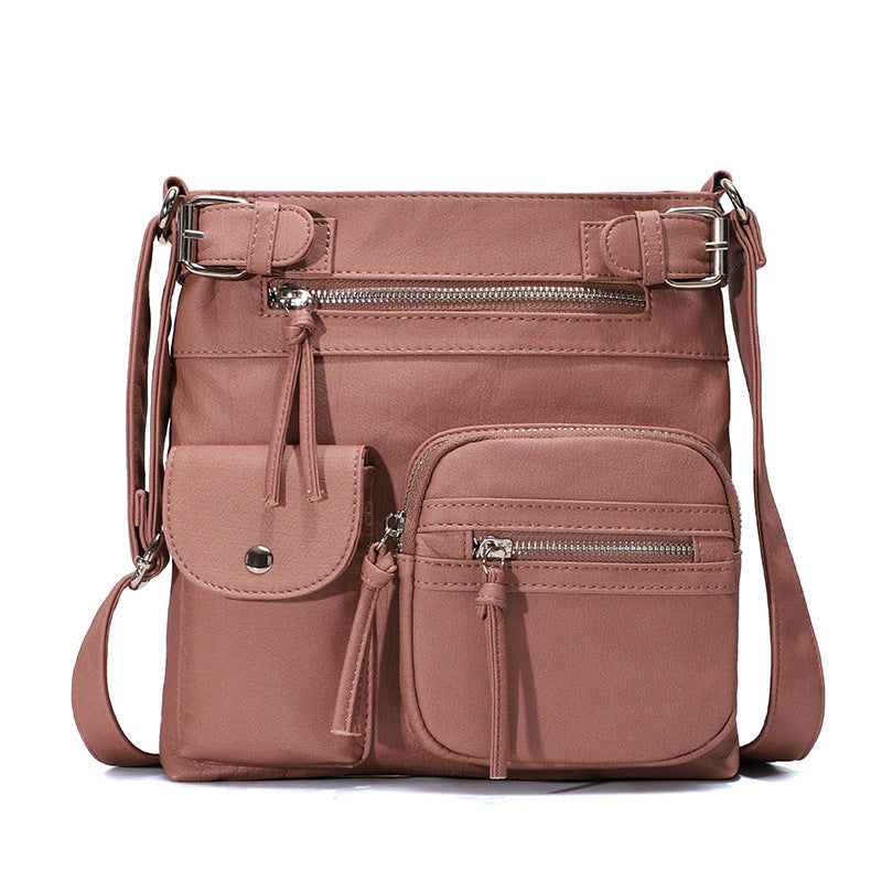 Myk crossbody-veske med flere lommer