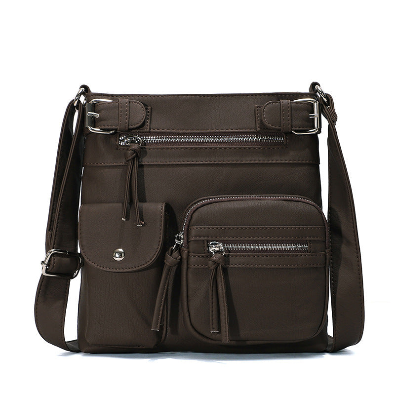 Myk crossbody-veske med flere lommer