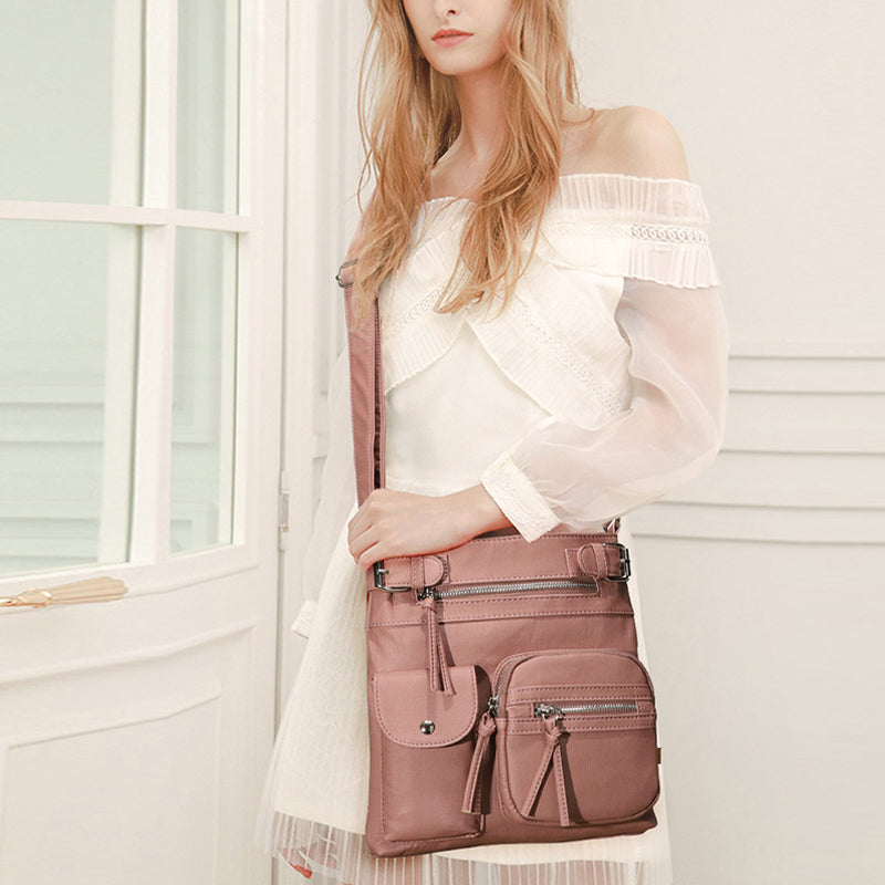 Myk crossbody-veske med flere lommer