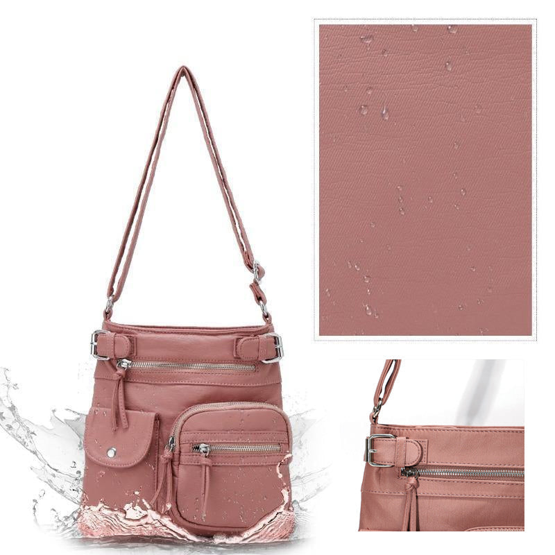 Myk crossbody-veske med flere lommer