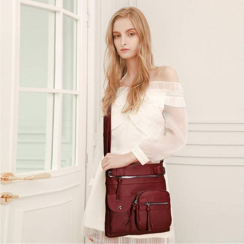 Myk crossbody-veske med flere lommer