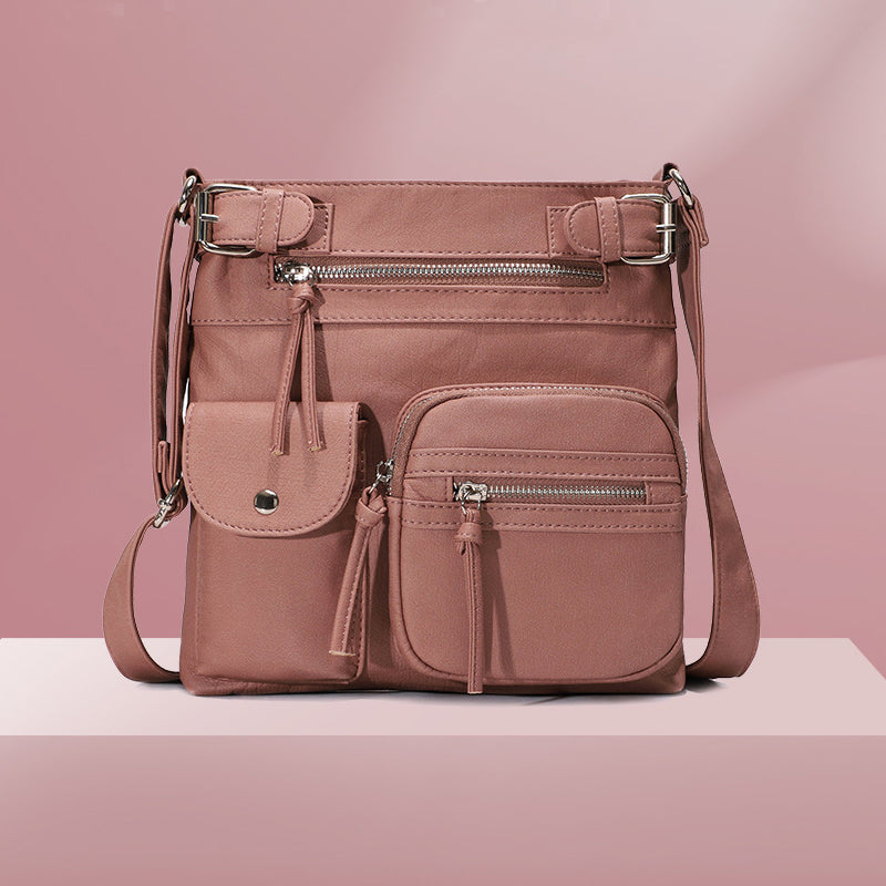 Myk crossbody-veske med flere lommer